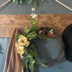 Front door wreath with golden flowers